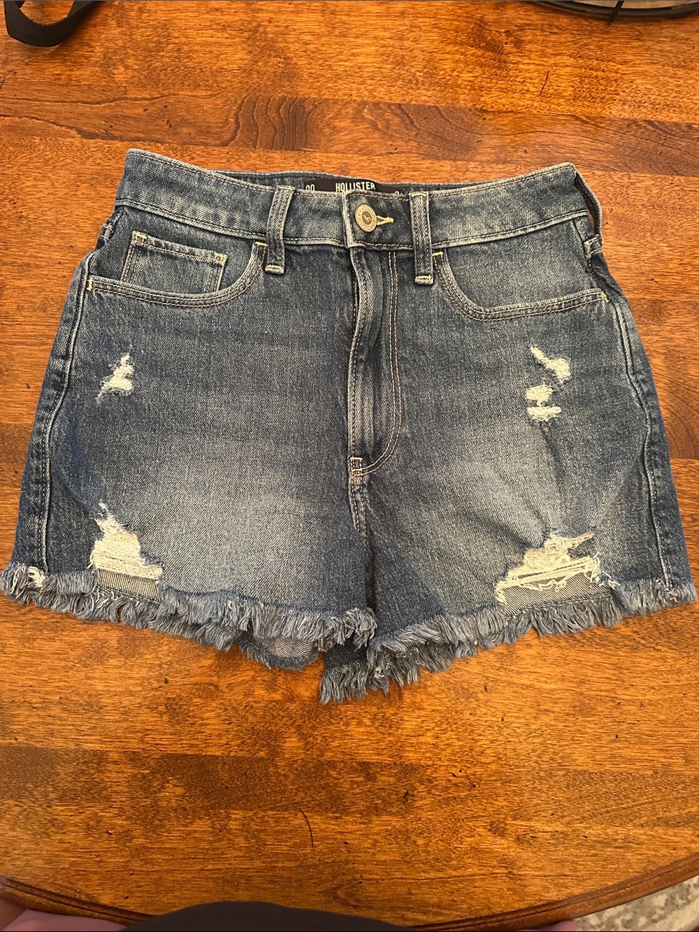 Hollister Distressed High-Rise Denim Shorts in Medium Blue